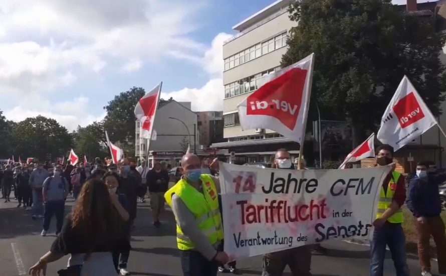 Beschäftigte der Charité Tochter CFM protestieren gegen den Berliner Finanzsenator: “Kollatz komm raus!”